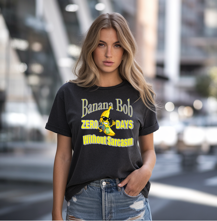 Woman wearing a black t-shirt with 'Banana Bob Zero Days Without Sarcasm' design in an urban setting.