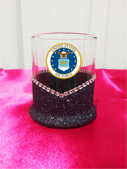 Glass tumbler with United States Air Force emblem on a pink background